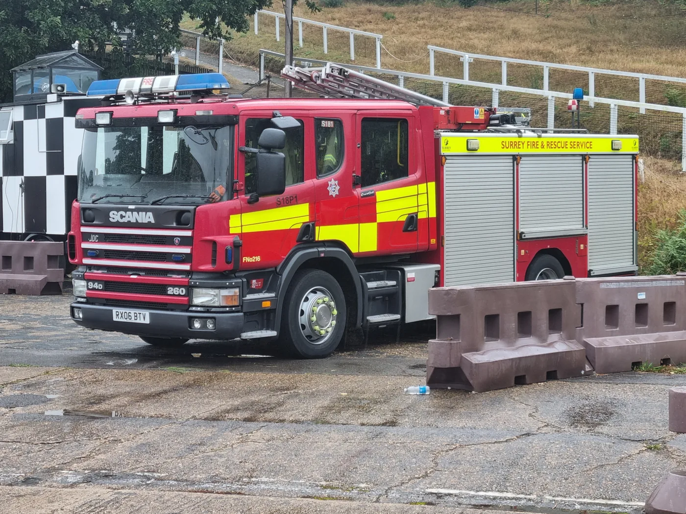 A Surrey Fire and Rescue Service appliance at an emergency services day at Brooklands Museum in 2023. The photograph is not from the Reigate event.