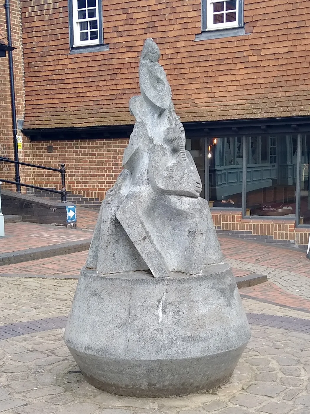 The Buskers, Carole Vincent's 1993 sculpture in Cage Yard, Reigate. The photo shows the yard, not the venue or any event described here.